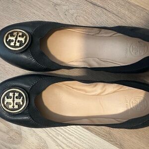 Tory Burch Black Flats with Gold Emblem
